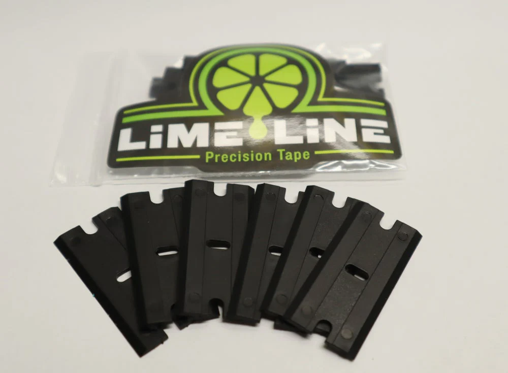 What material are the tape removal blades made of?
